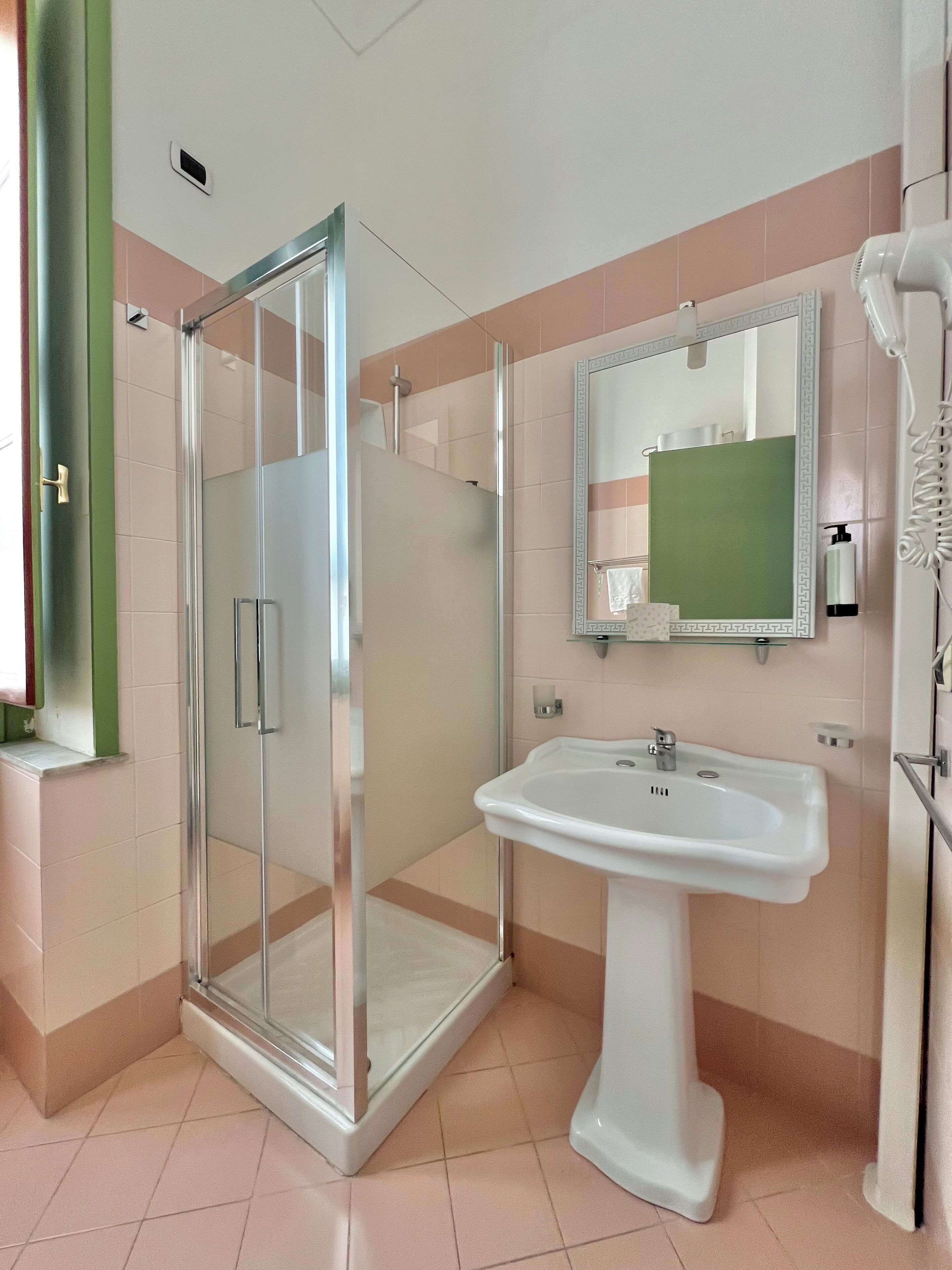 quadruple room | bathroom | shower, free toiletries, hair dryer, bathrobes