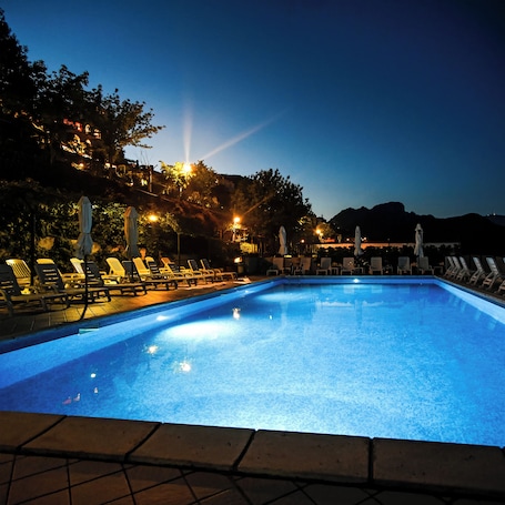 Seasonal outdoor pool, open 9:00 AM to 6:00 PM, sun loungers