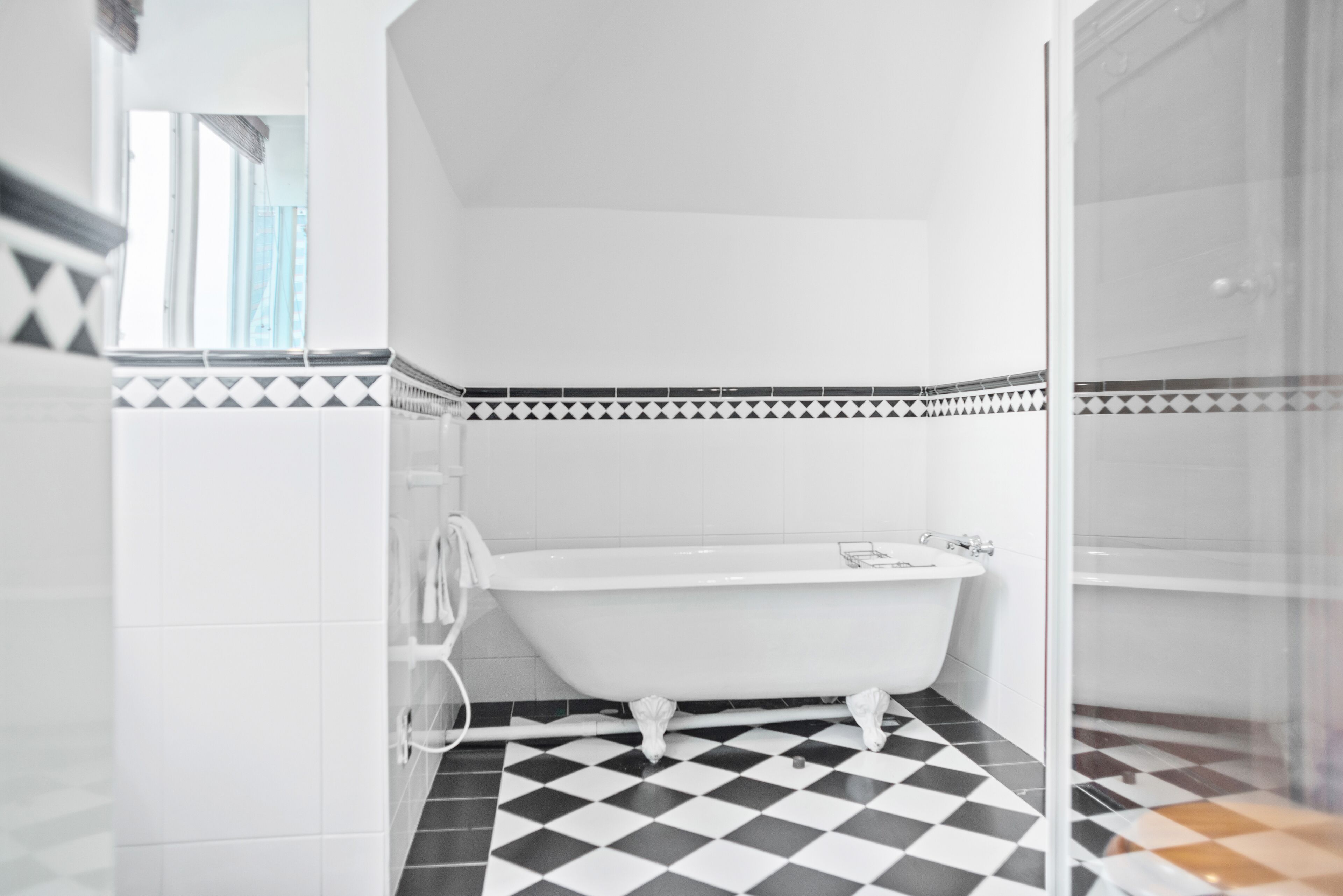 executive double room | bathroom | separate bathtub and shower, hair dryer, towels