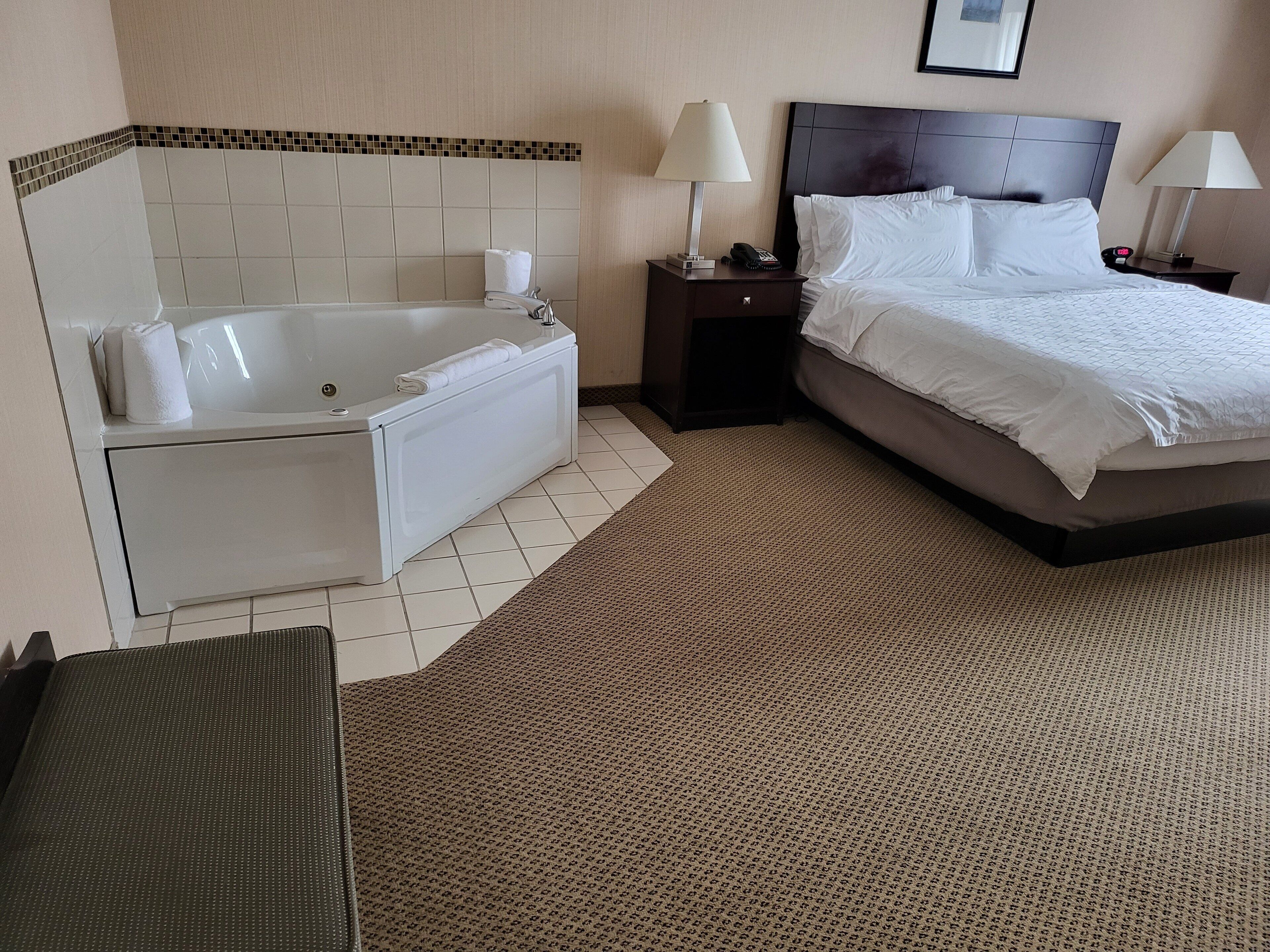 premium bedding, desk, blackout curtains, iron/ironing board