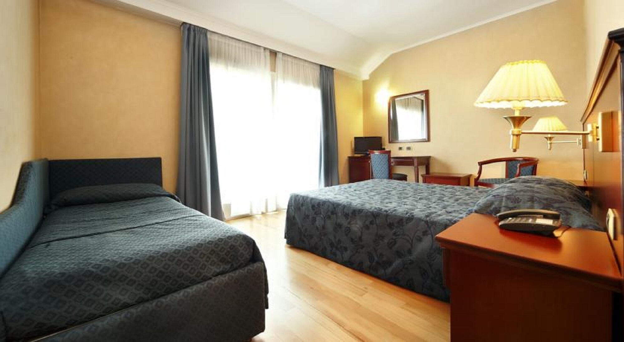 Hypo-allergenic bedding, minibar, in-room safe, desk