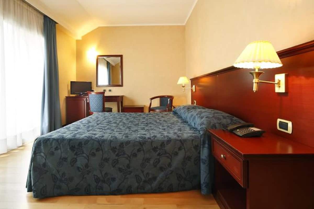 Hypo-allergenic bedding available, minibar, in-room safe, desk