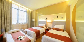 Classic Triple Room, Multiple Beds | Minibar, in-room safe, blackout drapes, soundproofing