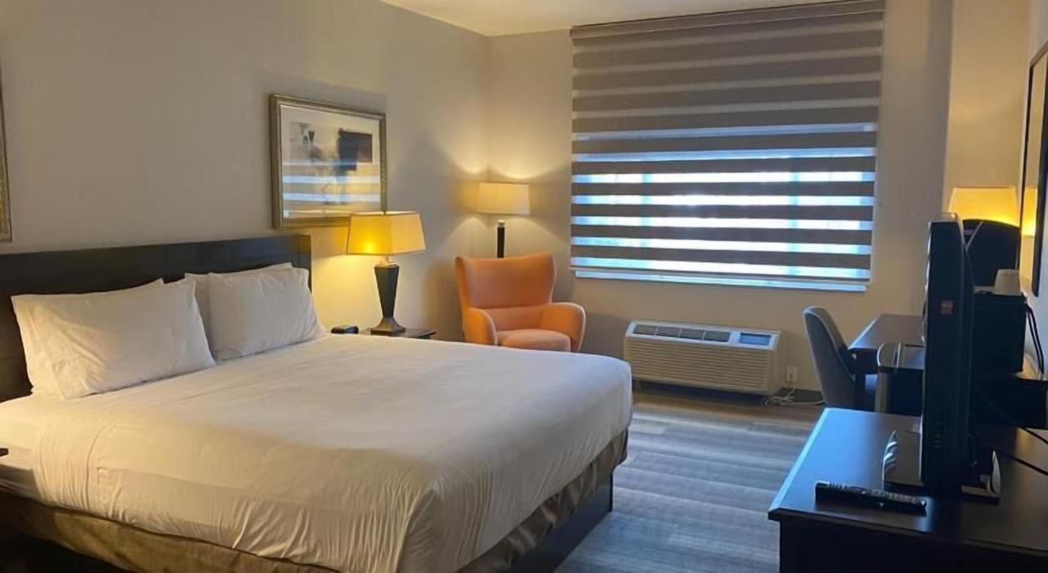 In-room safe, desk, blackout curtains, iron/ironing board