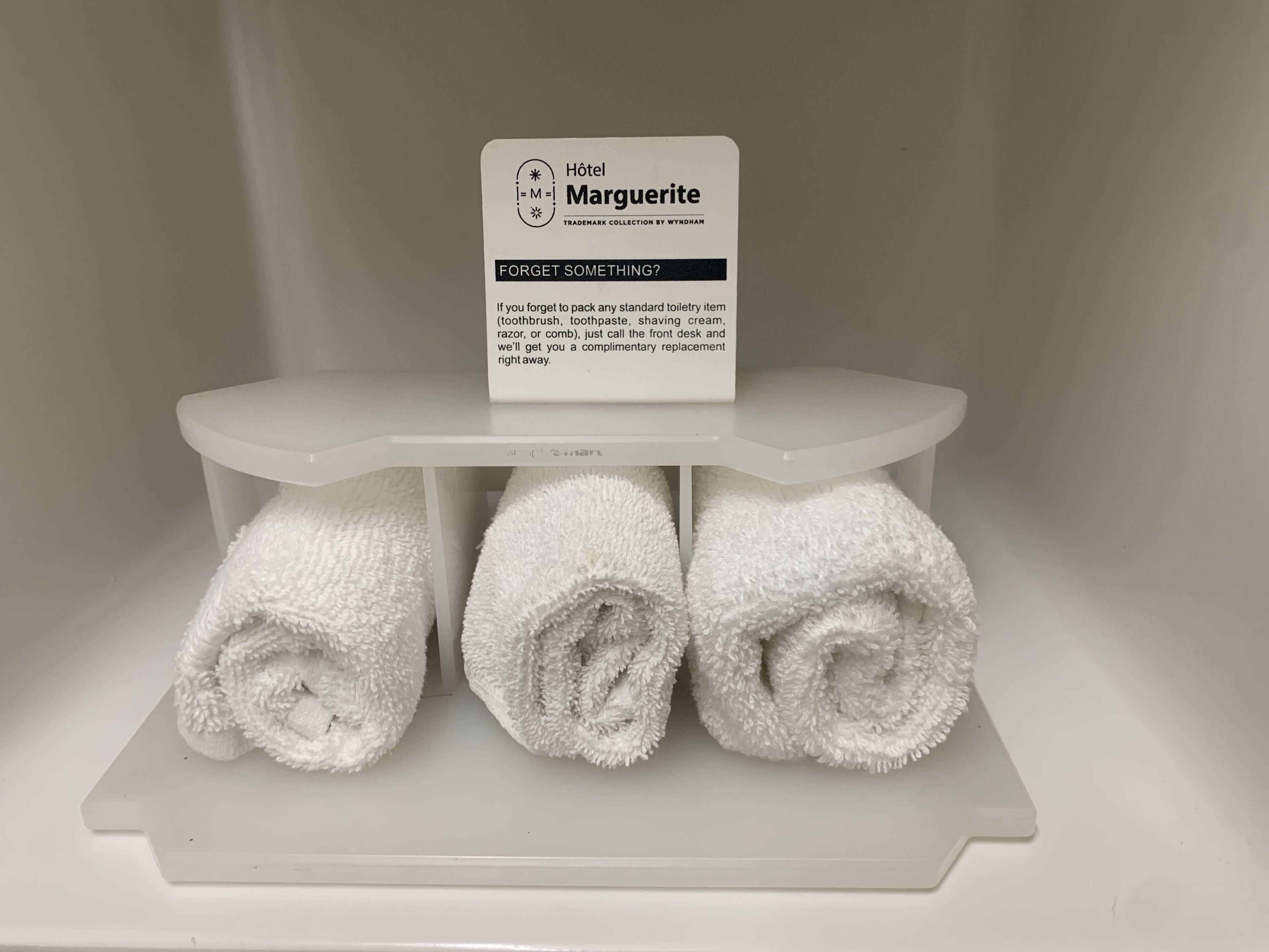 bathtub, deep-soaking bathtub, hair dryer, towels