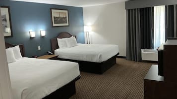 Desk, blackout drapes, iron/ironing board, free cribs/infant beds