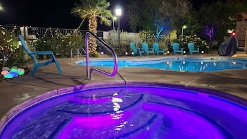 Outdoor pool, open 10:00 AM to 10:00 PM, pool umbrellas, pool loungers