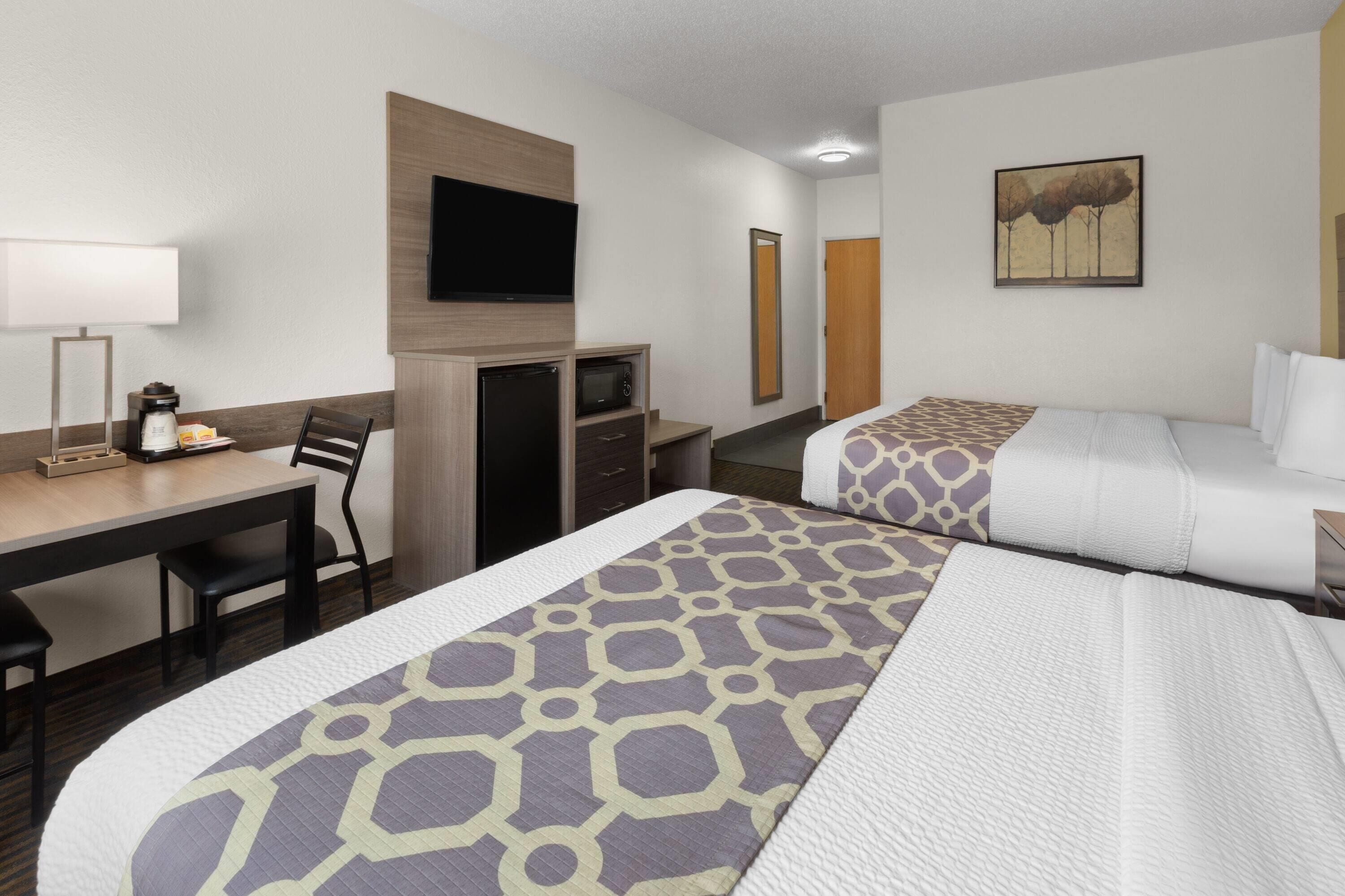 room, 2 queen beds, non smoking | desk, iron/ironing board, free cots/infant beds, rollaway beds