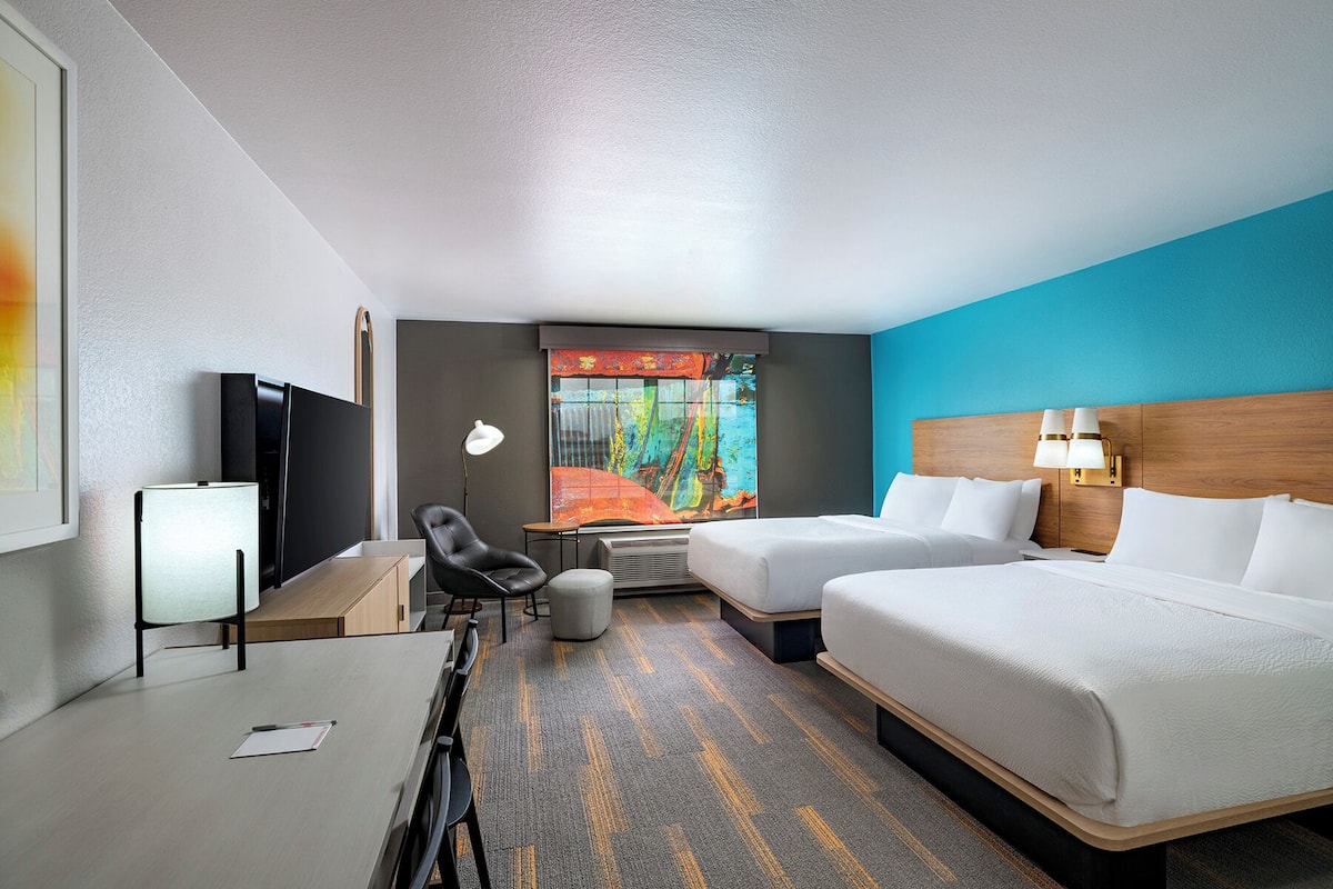 Premium bedding, pillow-top beds, desk, blackout curtains