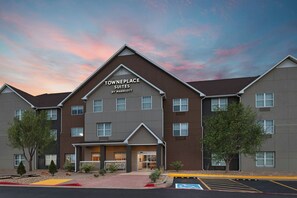 A Towneplace Suites by Marriott building with a modern design, featuring a prominent entrance and multiple windows. - TownePlace Suites by Marriott Lubbock (Lubbock)