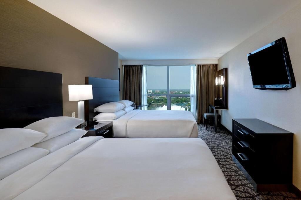 1 多间卧室、高档床上用品、客房内保险箱、办公桌