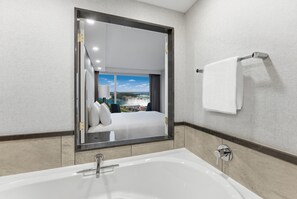Junior Presidential | Premium Fallsview Suite | One King Bed | Air Jetted Tub | Bathroom | Free toiletries, hair dryer, towels, soap
