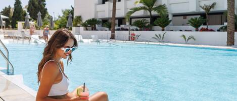 Outdoor pool, pool umbrellas, pool loungers