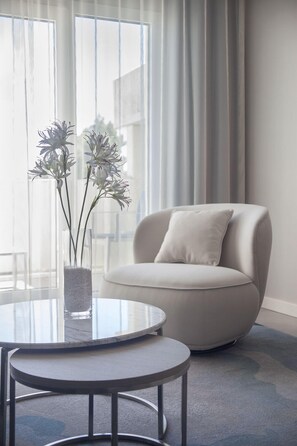 Premium Suite, Terrace | Living area | 50-inch LED TV with cable channels, TV