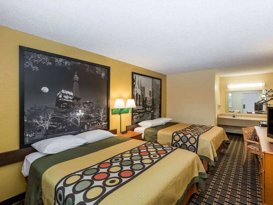 Desk, laptop workspace, blackout curtains, iron/ironing board