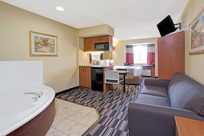 Deluxe Studio Suite, 1 Queen Bed, Non Smoking | Desk, laptop workspace, soundproofing, iron/ironing board