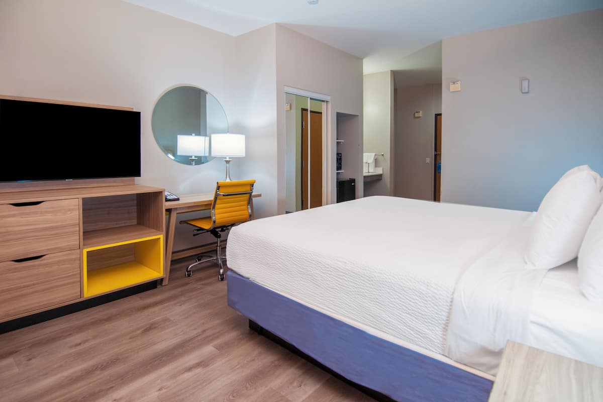 Premium bedding, down comforters, memory foam beds, in-room safe