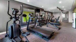 A gym with treadmills, elliptical machines, and weight benches. - La Quinta Inn by Wyndham North Myrtle Beach (North Myrtle Beach)