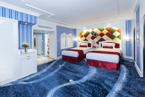 Premium bedding, pillow-top beds, minibar, in-room safe