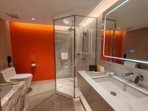 Exclusive Deluxe Room B with Extra Bed | Bathroom | Designer toiletries, hair dryer, bathrobes, slippers