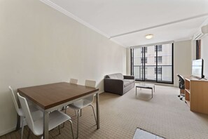 In-room safe, desk, laptop workspace, blackout curtains