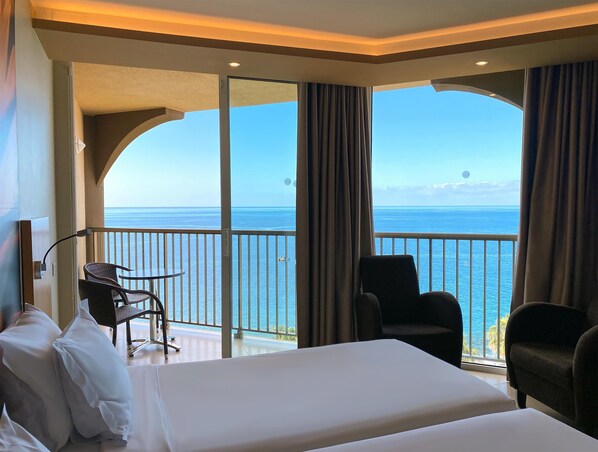 Classic Twin Room, Sea View | 1 bedroom, minibar, individually decorated, desk
