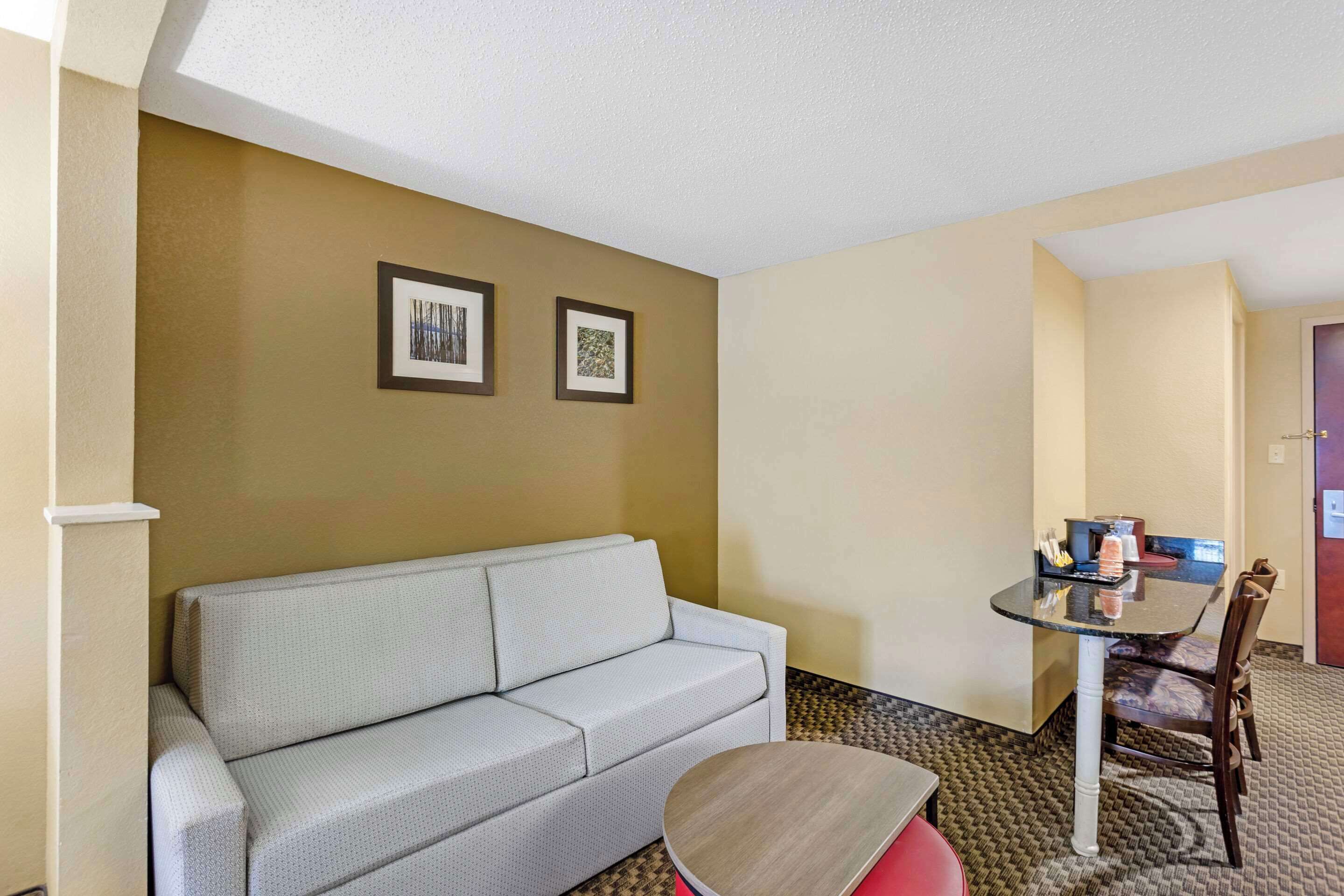 Desk, laptop workspace, blackout curtains, iron/ironing board