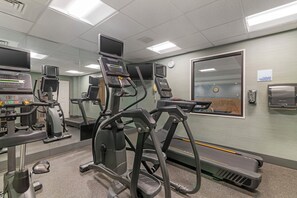 A gym with treadmills, elliptical machines, and exercise bikes. - Holiday Inn Express Biddeford by IHG (Biddeford)