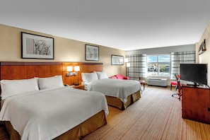 Premium bedding, pillow-top beds, desk, laptop workspace