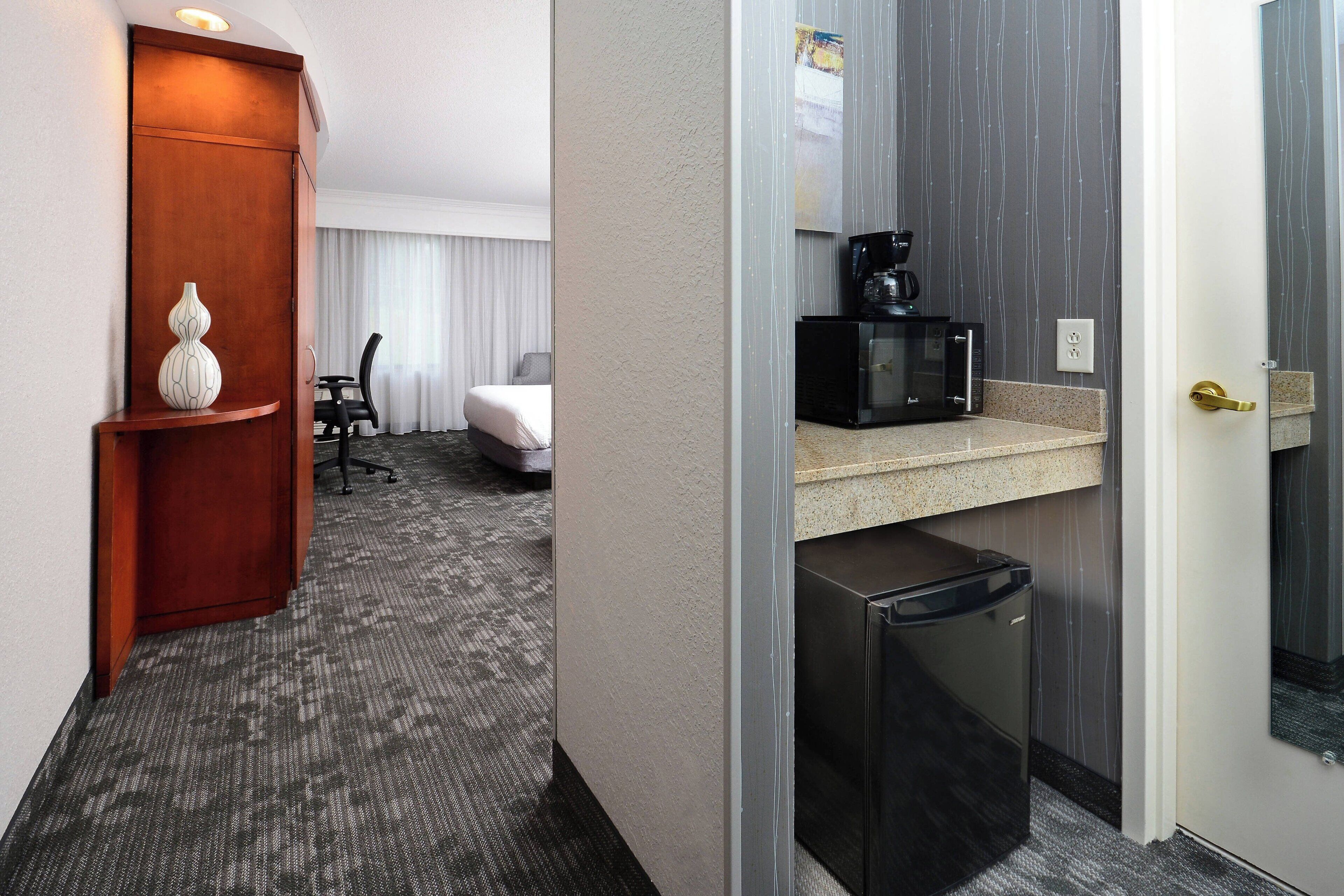 premium bedding, desk, laptop workspace, blackout curtains