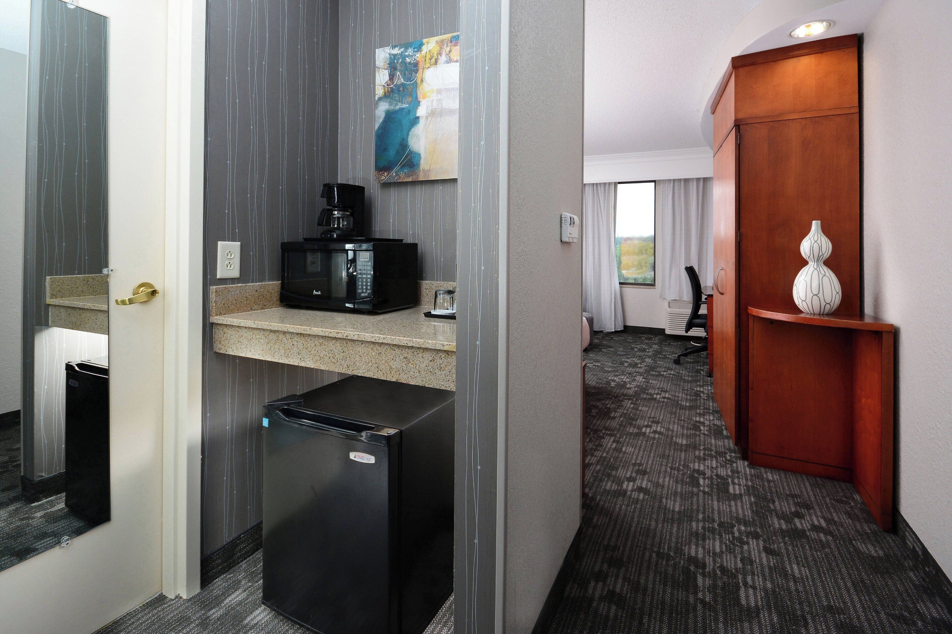 premium bedding, desk, laptop workspace, blackout curtains