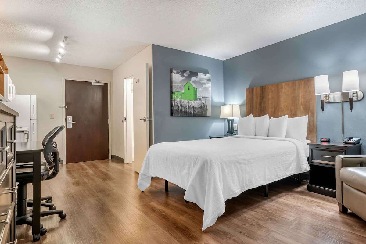Premium bedding, desk, blackout curtains, iron/ironing board