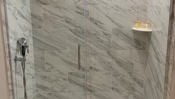 Deluxe Room, 1 Queen Bed | Bathroom | Shower, designer toiletries, hair dryer, bathrobes