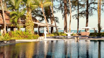 2 outdoor pools, pool umbrellas, pool loungers