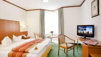 Hypo-allergenic bedding, down duvets, minibar, in-room safe