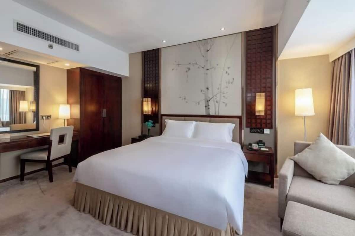 Minibar, blackout curtains, iron/ironing board, rollaway beds