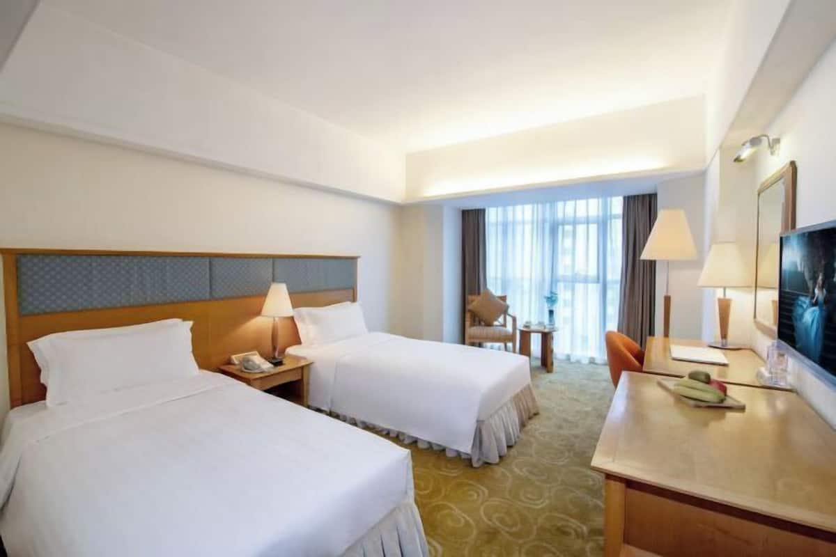 Minibar, blackout curtains, iron/ironing board, rollaway beds
