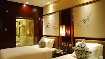 Minibar, blackout drapes, iron/ironing board, rollaway beds