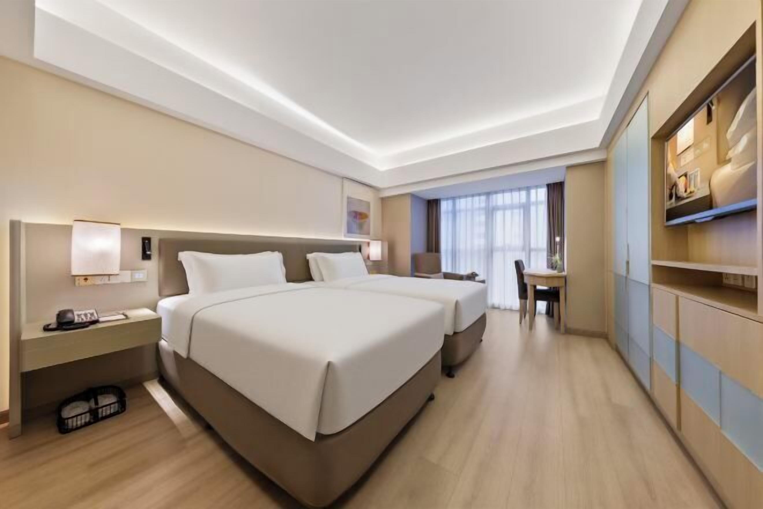 Minibar, blackout drapes, iron/ironing board, rollaway beds