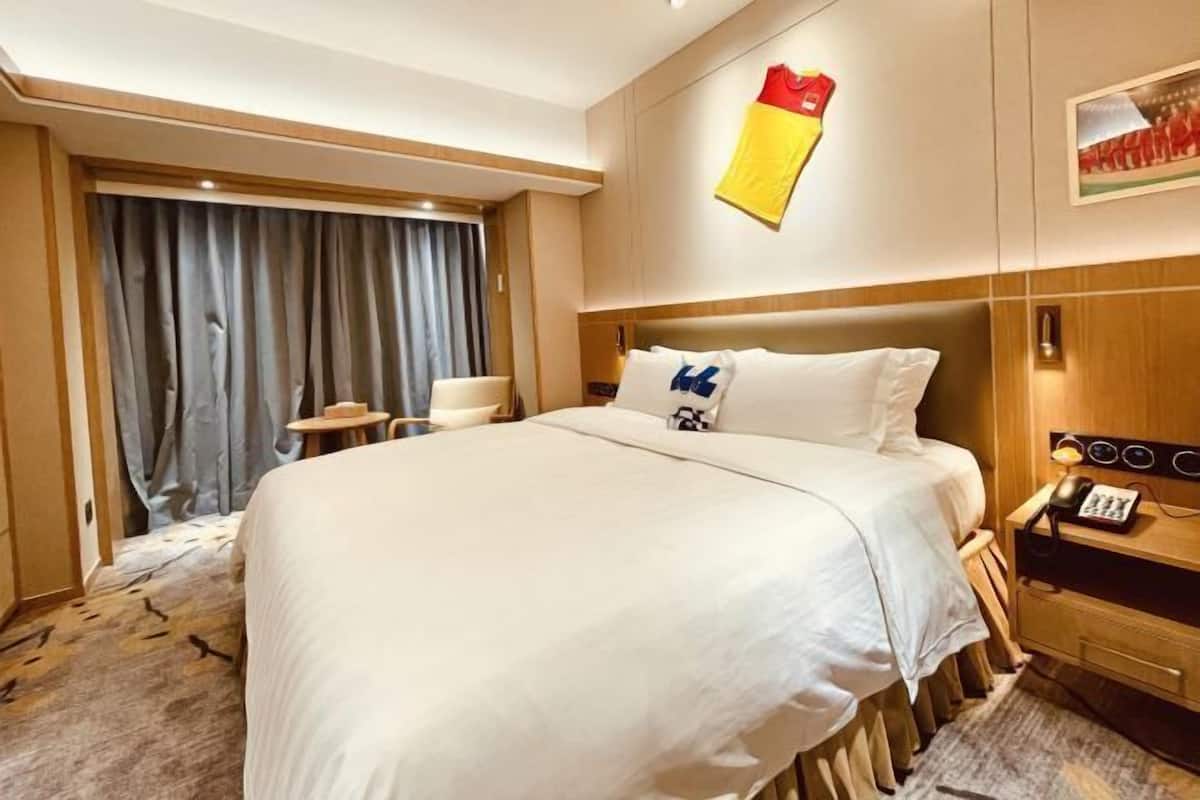 Minibar, blackout curtains, iron/ironing board, rollaway beds