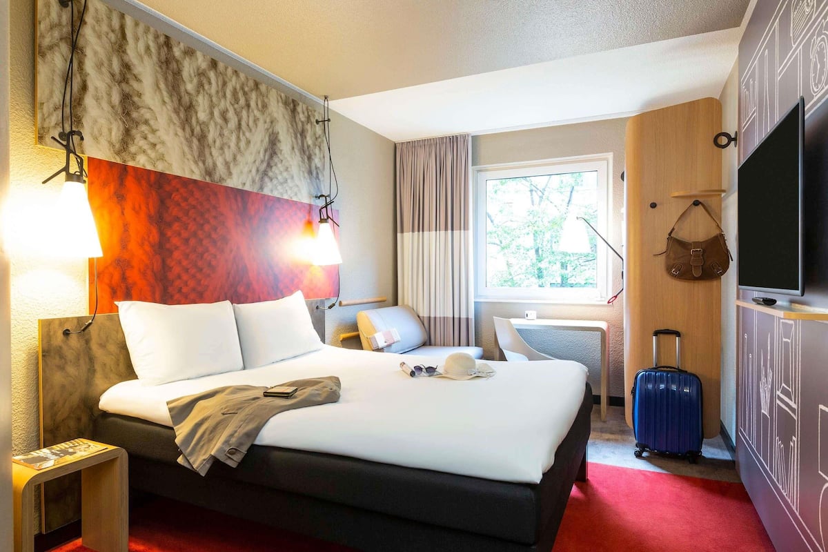 Hypo-allergenic bedding, pillow-top beds, in-room safe, desk