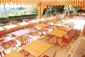 Lunch, dinner served; local cuisine, pool views