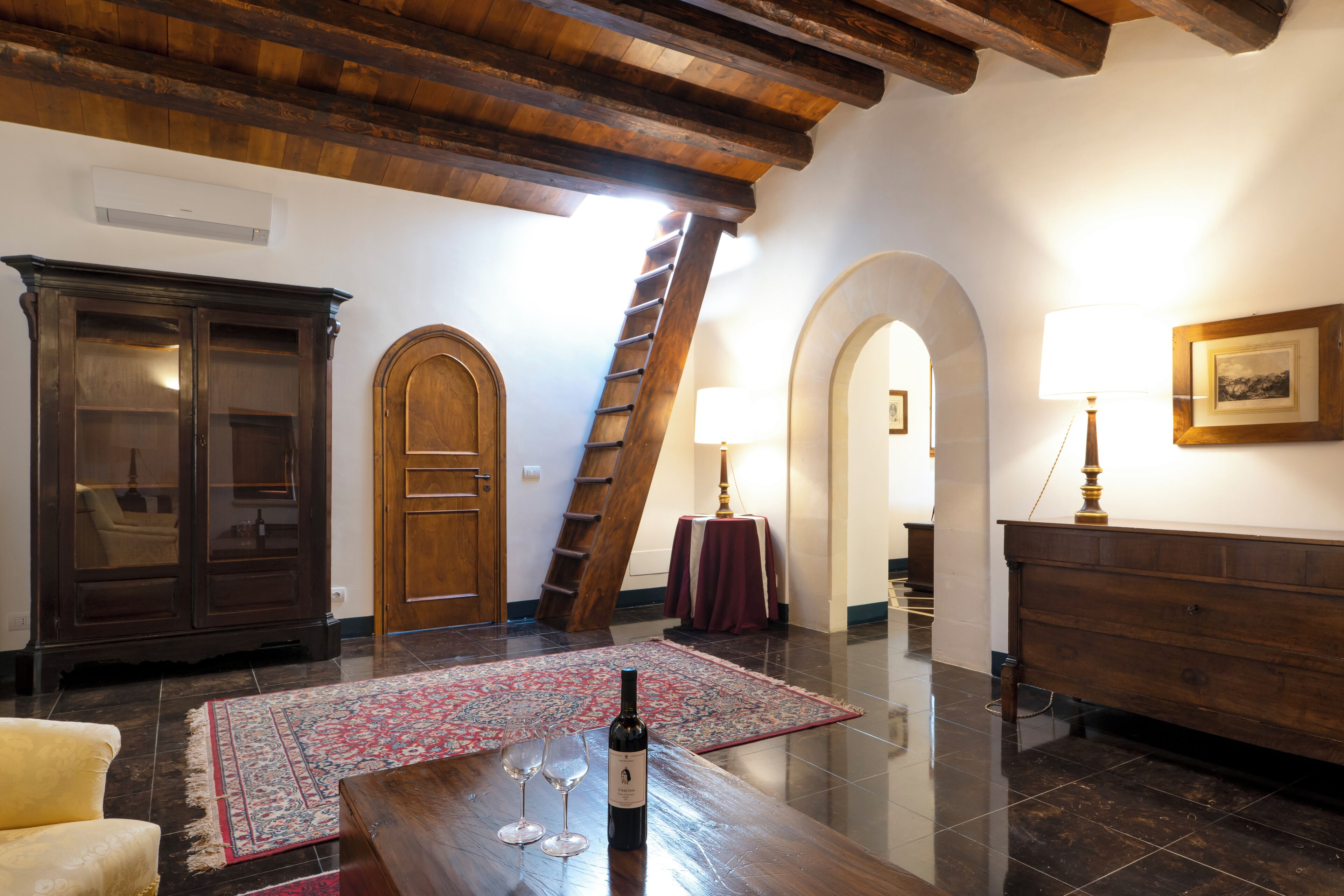 deluxe suite | living area | 24-inch flat-screen tv with satellite channels, tv, pay films