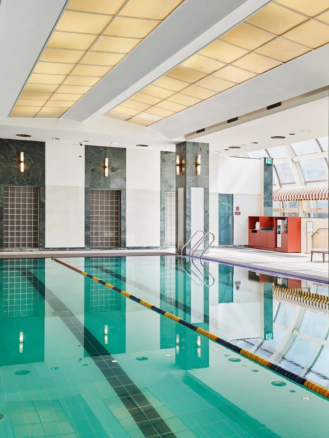 indoor pool, open 7:00 am to 8:00 pm, pool loungers