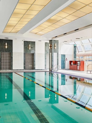 Indoor pool, open 7:00 AM to 8:00 PM, pool loungers