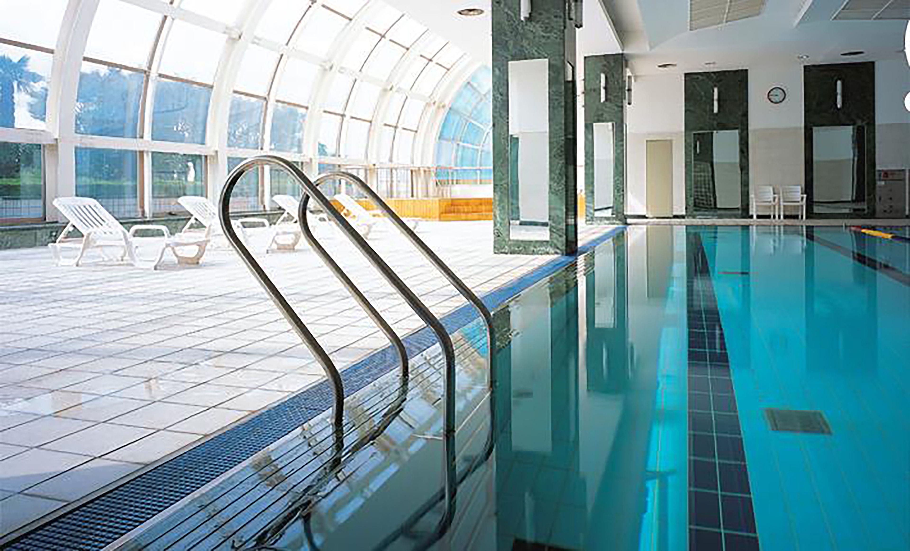 indoor pool, open 7:00 am to 8:00 pm, pool loungers