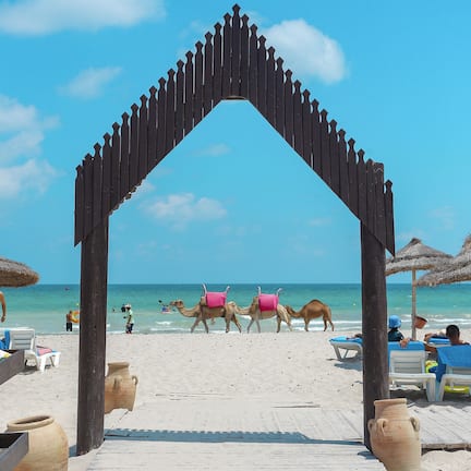 Private beach, white sand, sun loungers, beach umbrellas