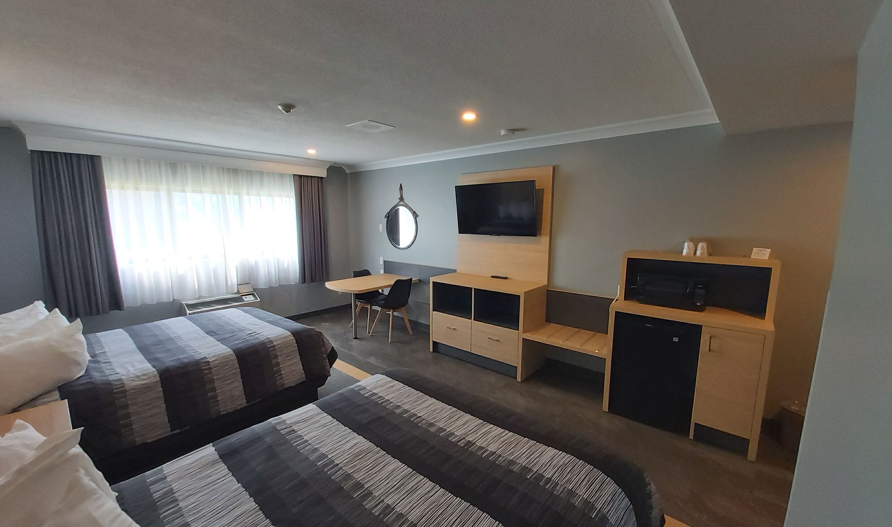 desk, blackout curtains, iron/ironing board, free cots/infant beds