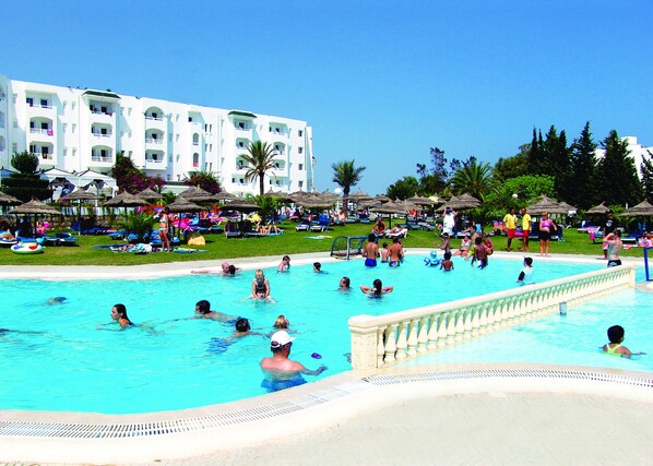 Indoor pool, outdoor pool, pool umbrellas, pool loungers