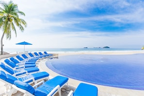 2 outdoor pools, sun loungers